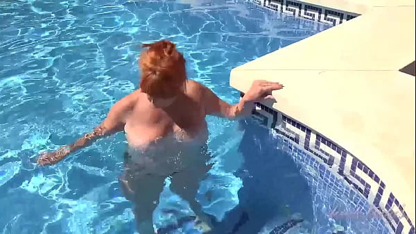 AuntJudys - Busty Mature Redhead Melanie goes for a swim