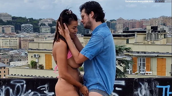 A couple fucking on a balcon in the middle of the city, not giving a damn about the fact that everyone can see them!