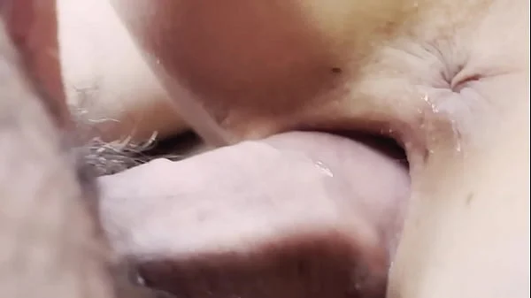 Doggystyle extremely close-up. Creampie