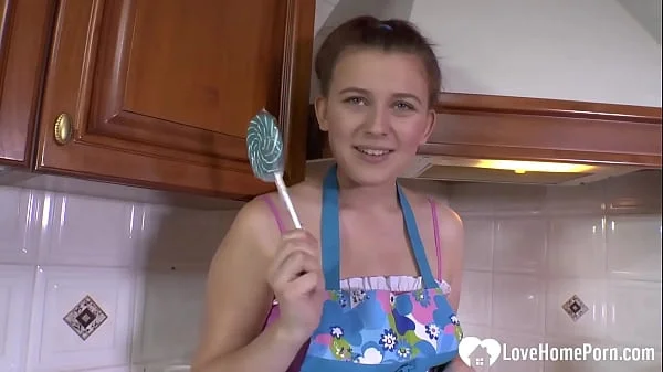Hot MILF enjoys sucking on a lollipop